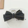 Black Cow Bow Grab Clip