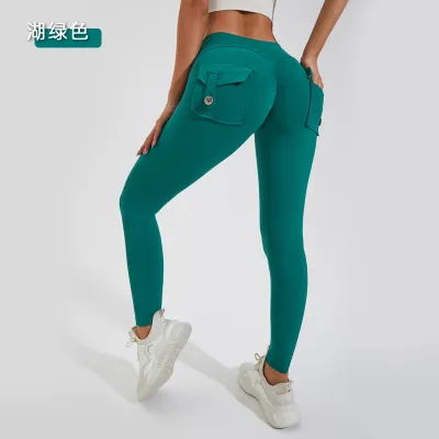 Women's Solid Color Pocket Sports Leggings with Nylon Fabric