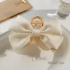 "Labeled" Satin Bow Hairpin Beige [Metal]]