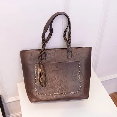 Women's Fashion Retro Solid Color Twist Tassel Pendant Handle Shoulder Bag