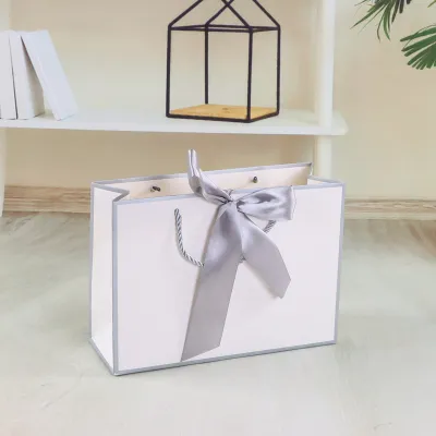 Simple Blank Kraft Paper Bow Gift Clothing Paper Bag