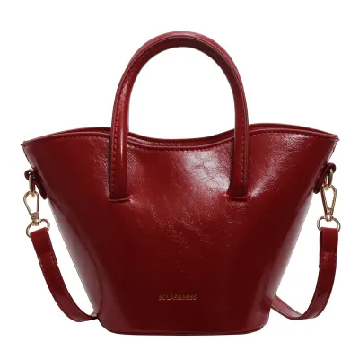 Women Fashionable Bow Ball Pendant PU Handle Shoulder Bucket Bag