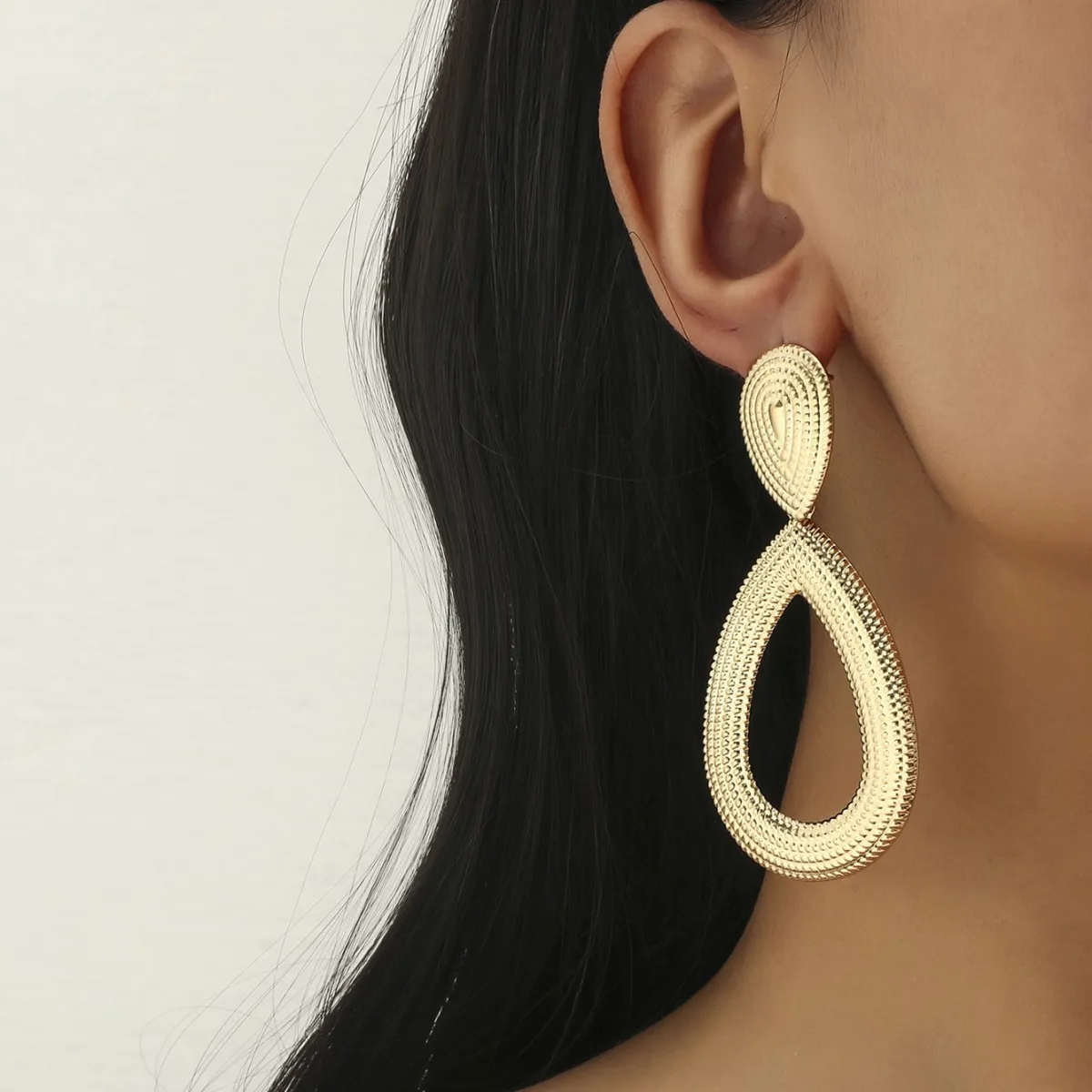 Women Simple Temperament Hollow Water Drop Earrings