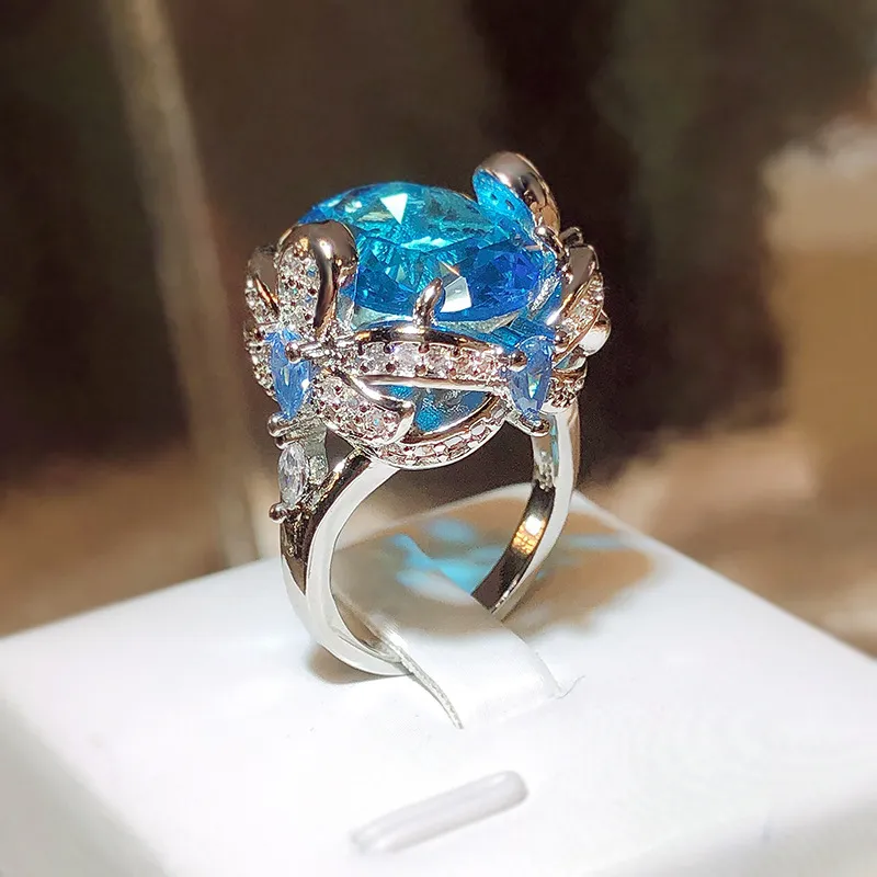 Women Fashion Blue Zircon Floral Instagram Wind Ring