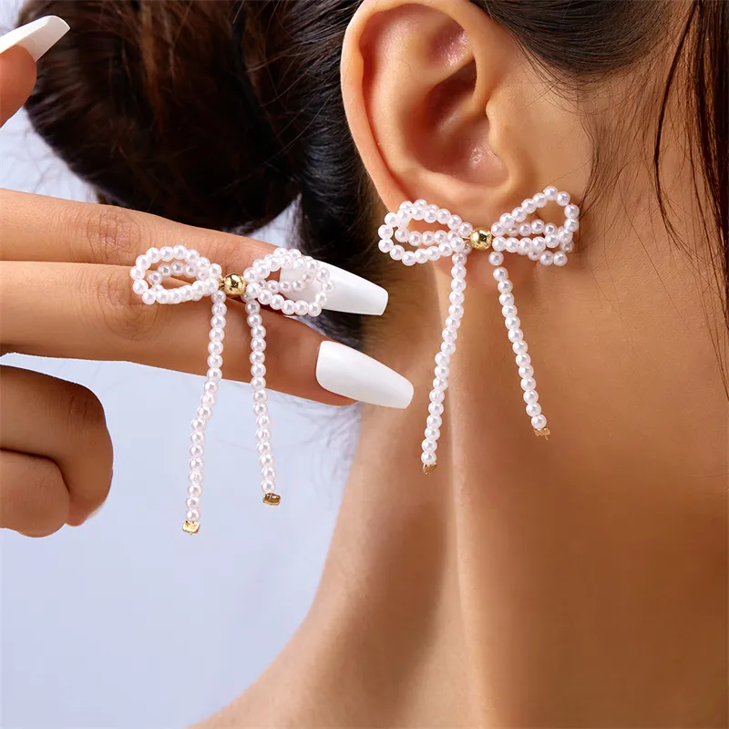 Women Simple Fashion Imitation Pearl Bow Earrings
