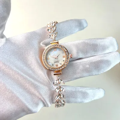 Women Fashion Roman Numerals Round Dial Diamond Pull-Out Bracelet Watch