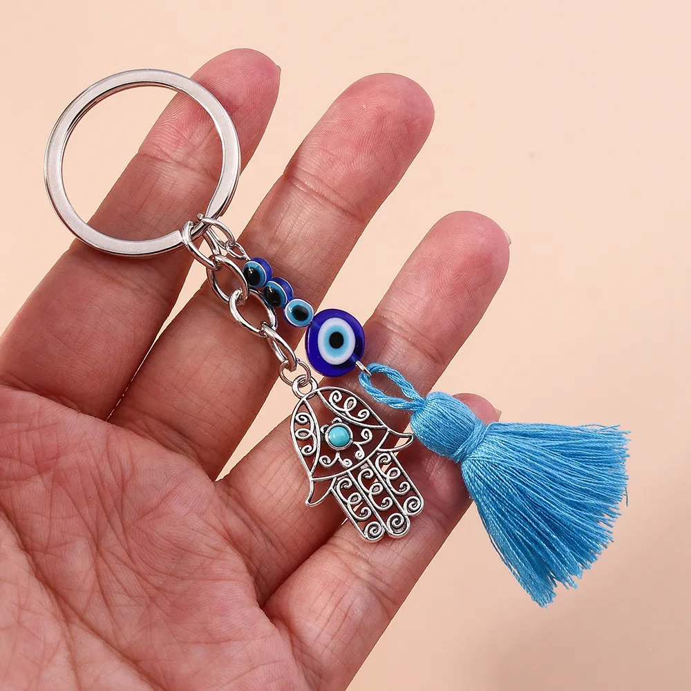Women Fashion Devil Eye Hollow Palm Tassel Key Chain Pendant