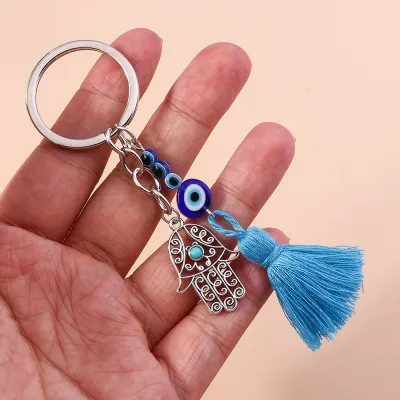 Women Fashion Devil Eye Hollow Palm Tassel Key Chain Pendant
