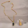 Gold Black Card Letter Necklace