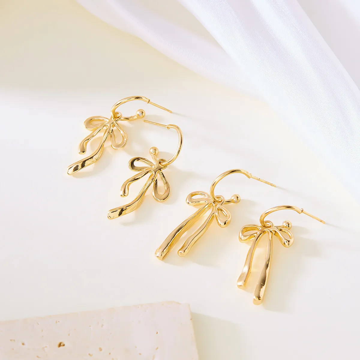 Women Fashion Simple Long Bowknot Copper Earrings