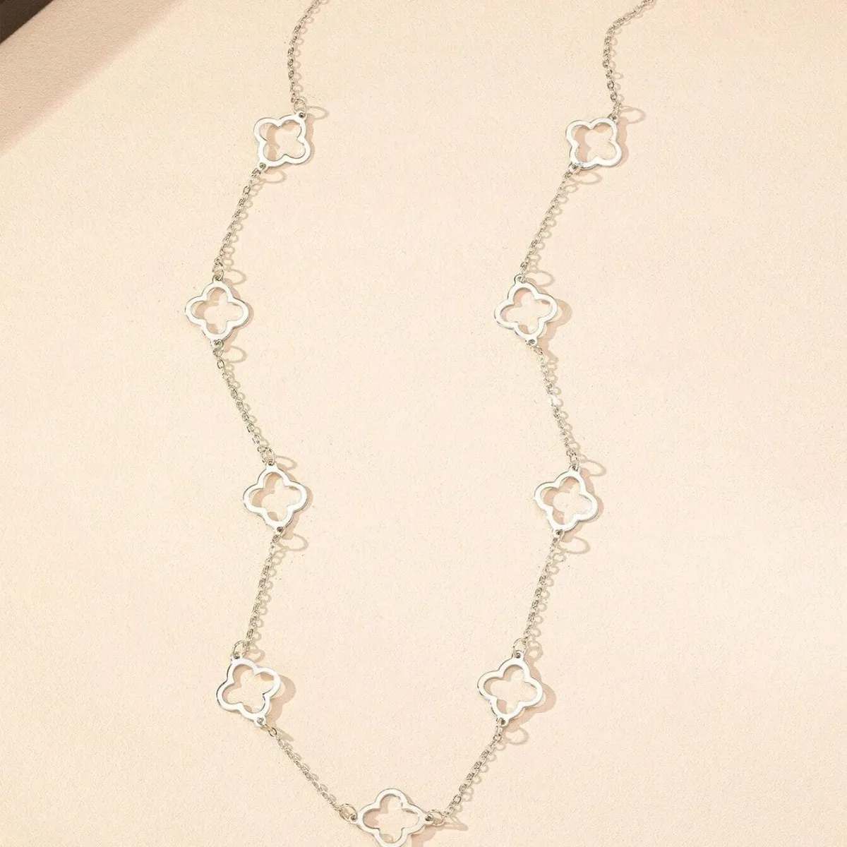 Women Fashion Hollow Four-Leaf Flower Long Alloy Pendant Necklace