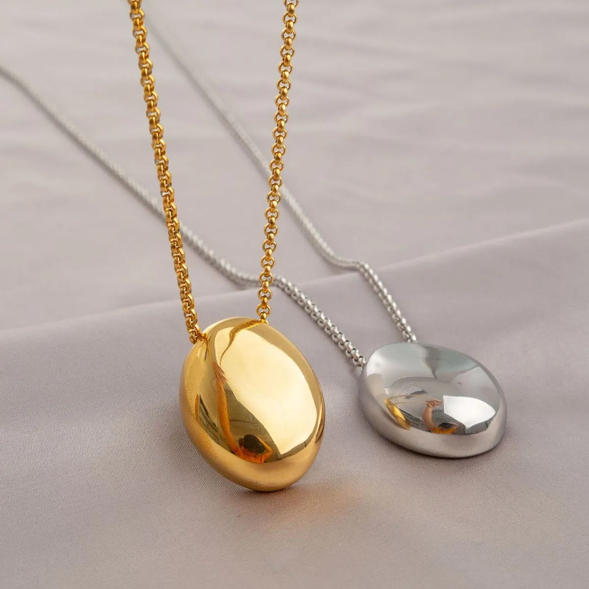 Women Fashion Exaggerated Titanium Steel Oval Pendant Long Necklace