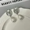 Pair Of Silver Stud Earrings