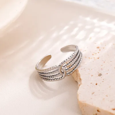 Fashion Personalized Stainless Steel Gold Hollow Line Winding Titanium Steel Ring