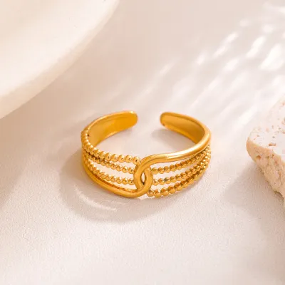 Fashion Personalized Stainless Steel Gold Hollow Line Winding Titanium Steel Ring