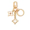 Beige Four-Leaf Clover Straight Gold Chain Door Buckle