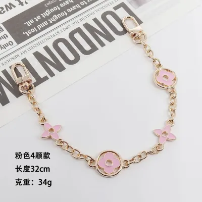 Women Fashion Metal Bag Chain Keychain with Four-Leaf Clover Star Sun Moon Cloud Universe Pattern