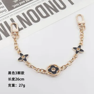 Women Fashion Metal Bag Chain Keychain with Four-Leaf Clover Star Sun Moon Cloud Universe Pattern