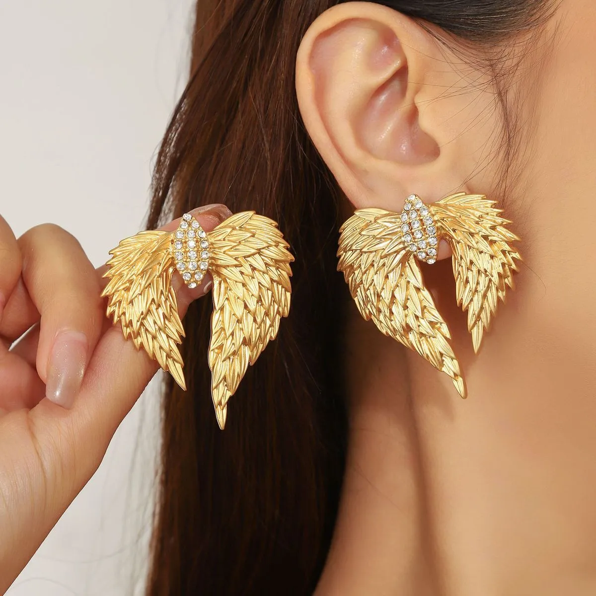Women Fashion Exaggerated Asymmetric Wings Alloy Earrings