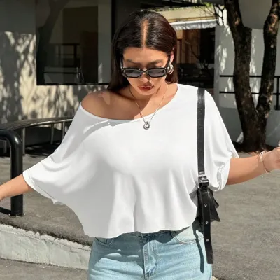 Camiseta de manga corta con cuello redondo y color liso, sencilla y de talla grande para mujer