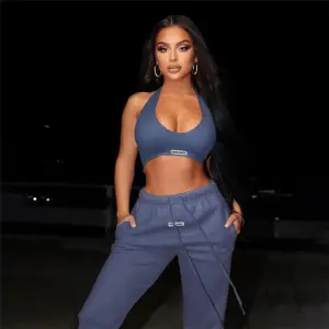 Women Athleisure Solid Color Sleeveless Cut Out Halter Neck Crop Top And Drawstring Waist Jogger Pants Two-piece Set