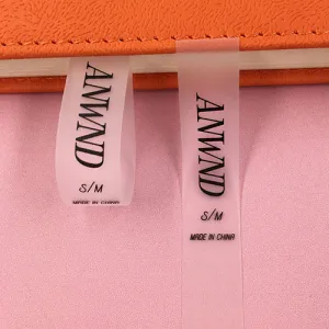 Etiquetas de tela con borde rugoso y logotipo personalizado para ropa