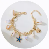 Pulsera tejida ajustable con diseño de estrella de mar y concha de playa para mujer